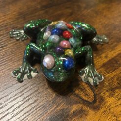 Green glitter resin frog with multicolored beads