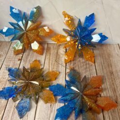 Set of 4 blue orange snowflake ornaments - bears colors
